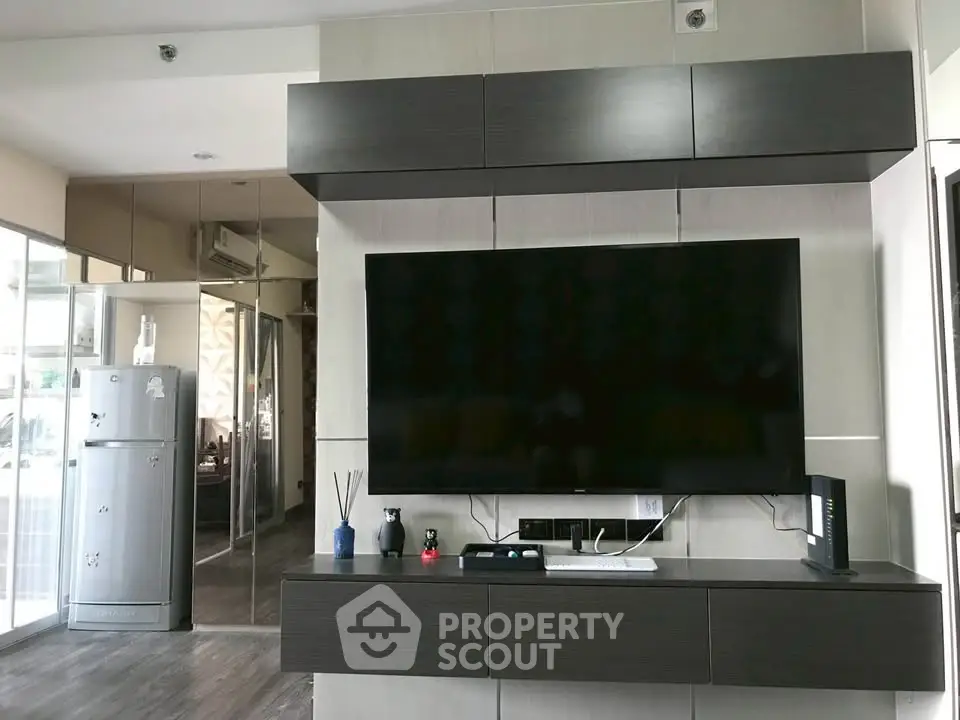 Modern living room with sleek TV setup and stylish decor
