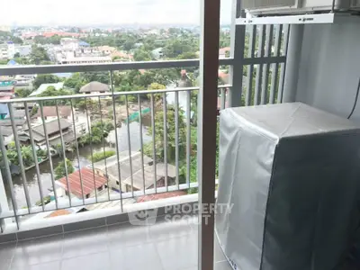 High-rise balcony with scenic city and river view, featuring outdoor washing machine setup.