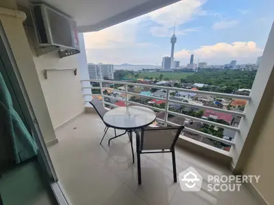 Stunning balcony view with cityscape and tower, perfect for relaxation and enjoying the skyline.