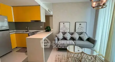 Modern living room with stylish kitchen and elegant decor