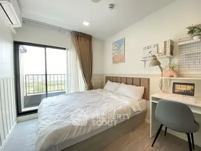 Cozy modern bedroom with balcony view and stylish decor