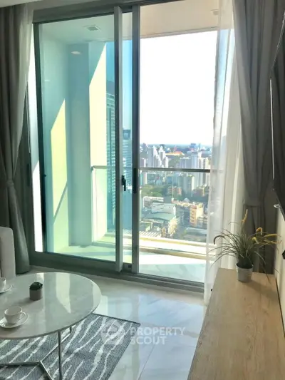 Stunning high-rise apartment with floor-to-ceiling windows and city view