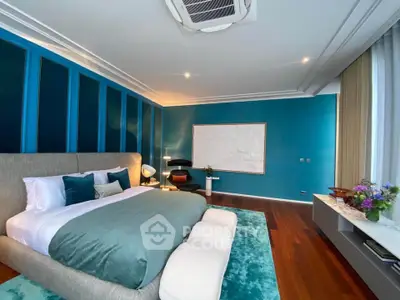 Luxurious bedroom with modern decor and elegant lighting in a stylish apartment.