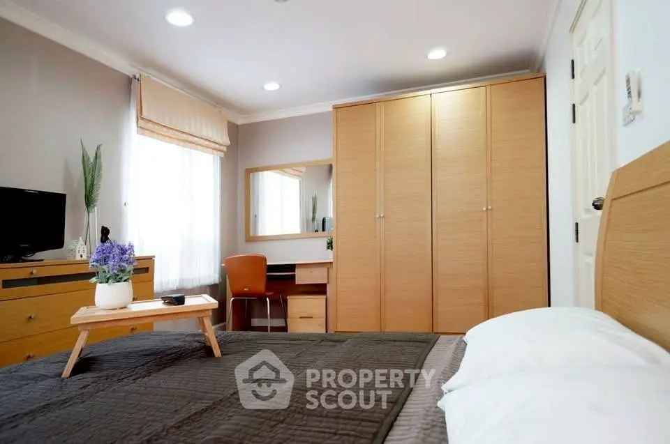 Cozy bedroom with modern furniture and natural light