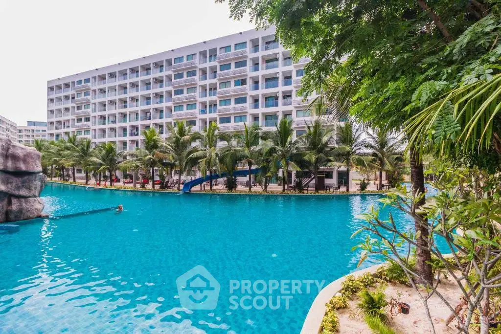 Luxurious condominium with stunning pool and lush greenery, perfect for resort-style living.