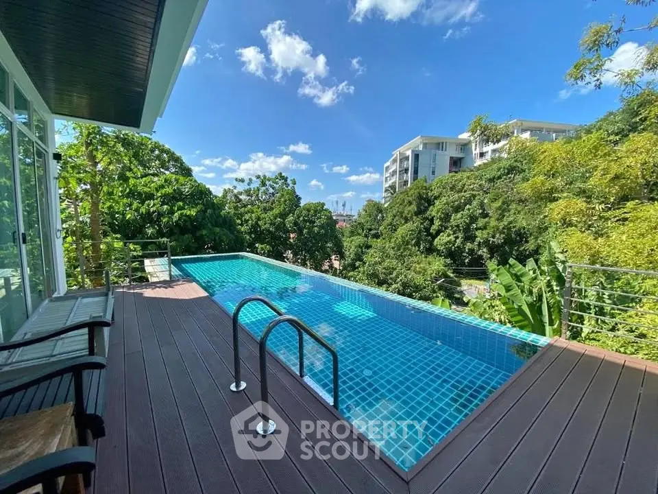 Luxurious infinity pool with stunning view in modern residential area