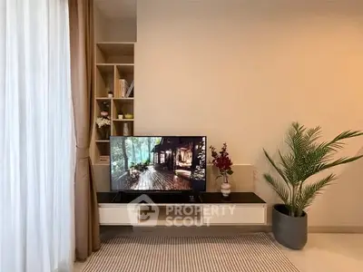 Modern living room with stylish TV setup and elegant decor