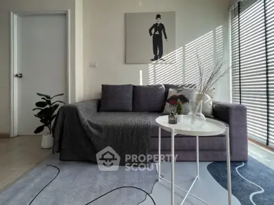 Modern living room with stylish decor and natural light