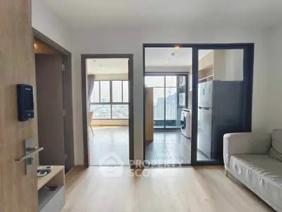 Modern apartment interior with open kitchen and city view