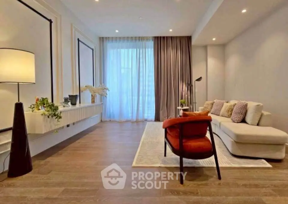 Elegant living room with modern decor and cozy seating area