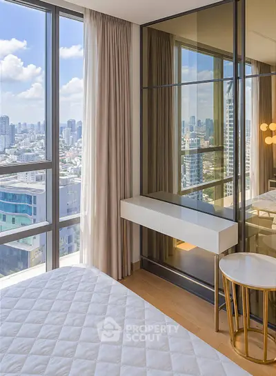 Luxurious bedroom with stunning city view and modern decor in high-rise apartment.