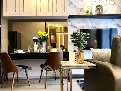 Modern living room with elegant dining area and stylish decor