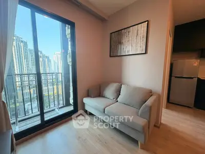 Modern living room with balcony view in high-rise apartment