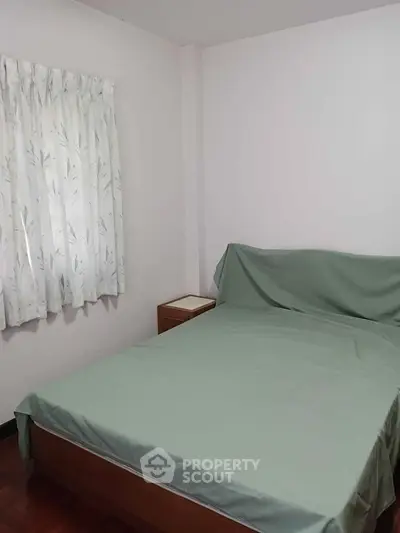 Cozy bedroom with simple decor and natural light