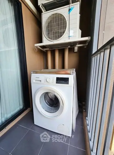 Compact balcony with washing machine and air conditioning unit