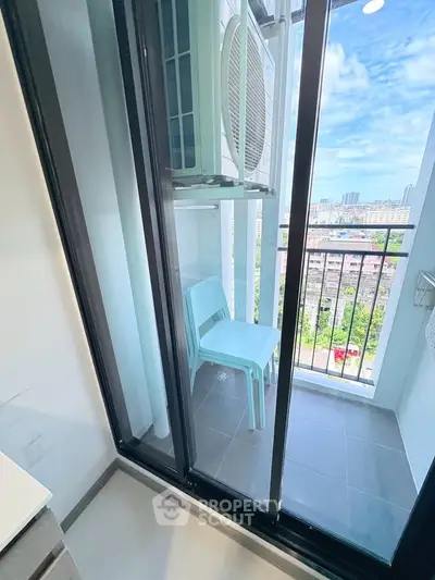 Charming balcony with city view, perfect for relaxation and enjoying the skyline.