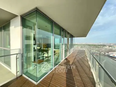 Stunning corner unit with expansive balcony and panoramic city views, perfect for modern living.