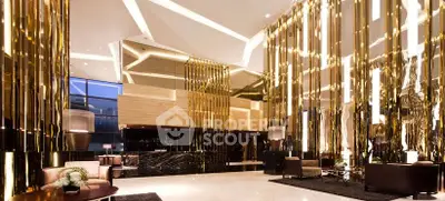 Luxurious modern lobby with elegant lighting and stylish decor, perfect for upscale living.