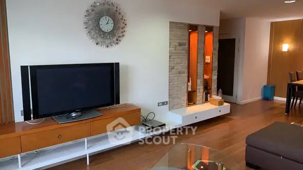 Stylish living room with modern decor and wall-mounted TV