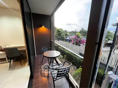 Charming balcony with outdoor seating and scenic view, perfect for relaxation and enjoying the outdoors.