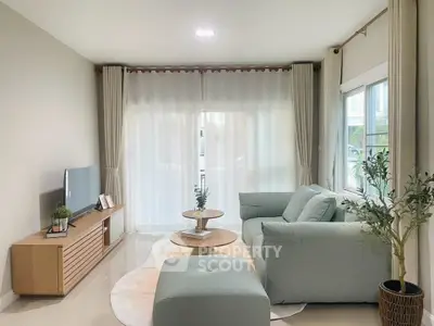 Modern living room with stylish furniture and natural light