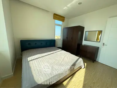 Bright bedroom with modern furniture and natural light