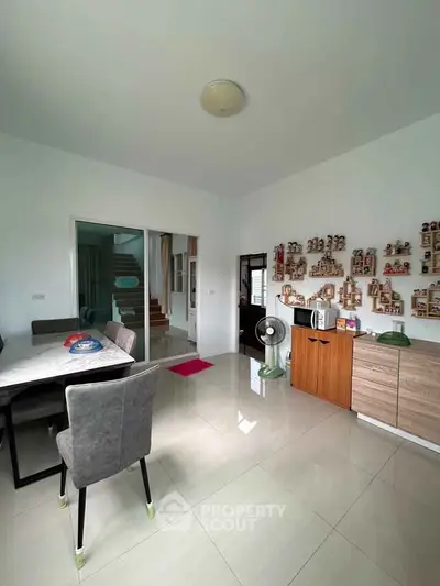 Spacious modern living room with elegant decor and ample natural light