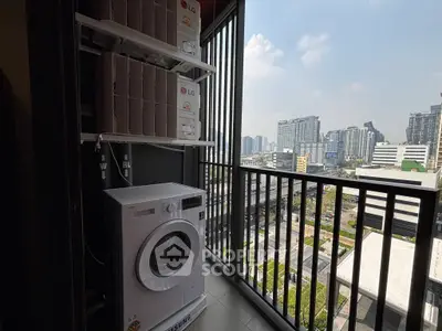 Modern balcony with washing machine and city view, perfect for urban living.