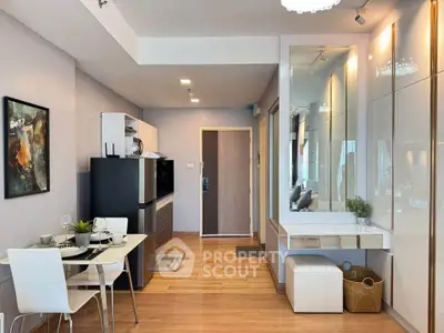 Modern open-plan living area with dining table and stylish decor