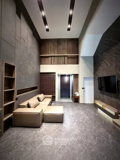 Luxurious modern living room with high ceilings and elegant decor