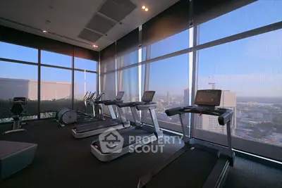 Modern gym with panoramic city views and state-of-the-art equipment