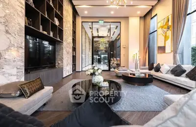 Luxurious modern living room with elegant decor and marble accents