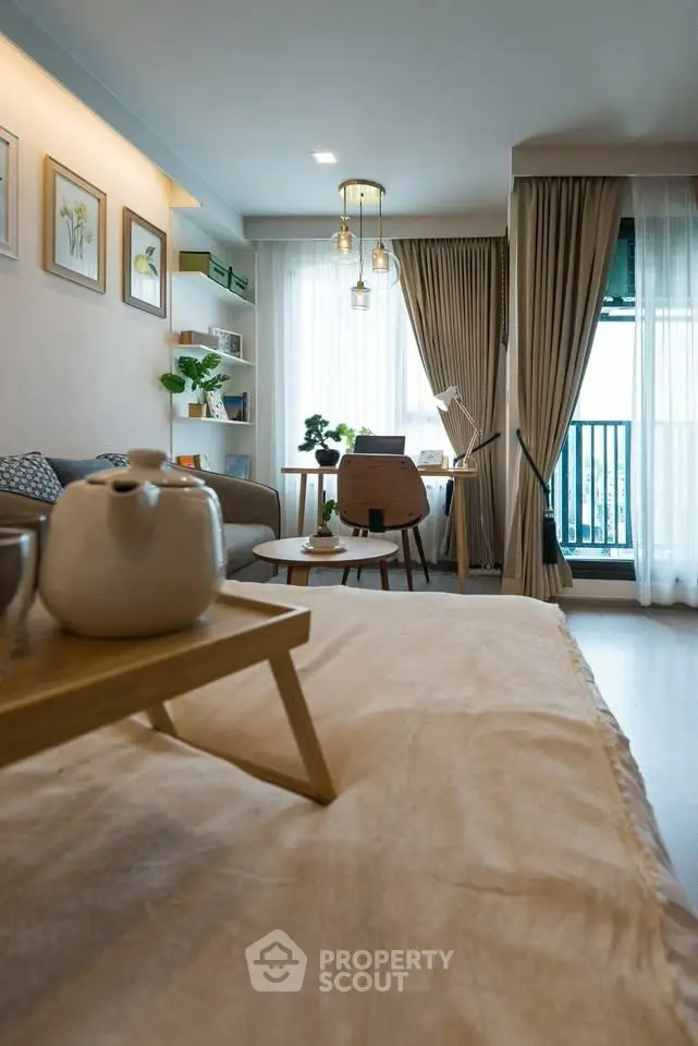 Chic living room with modern decor and balcony view