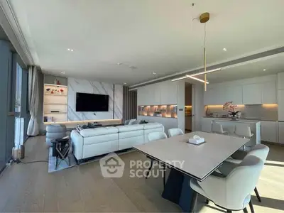 Luxurious open-plan living room with modern kitchen and elegant dining area