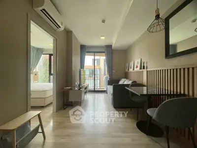 Modern apartment with open living room and balcony view