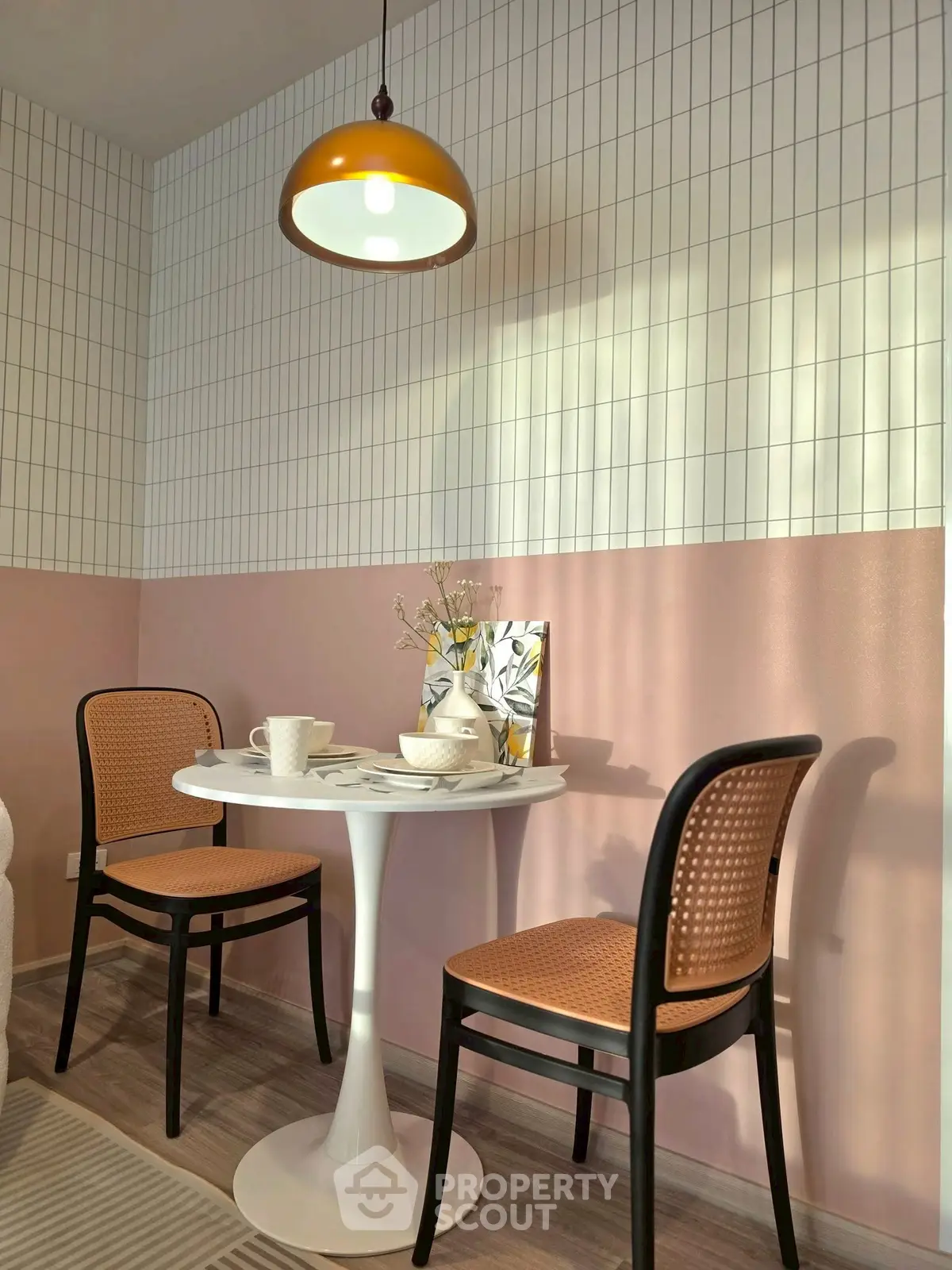 Charming dining nook with modern decor and stylish lighting