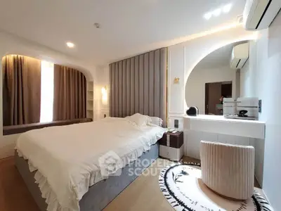 Luxurious bedroom with modern design, featuring elegant lighting and stylish decor, perfect for a serene retreat.