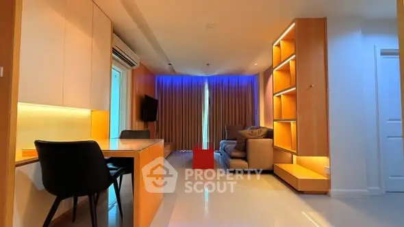Modern living room with ambient lighting and sleek furniture design