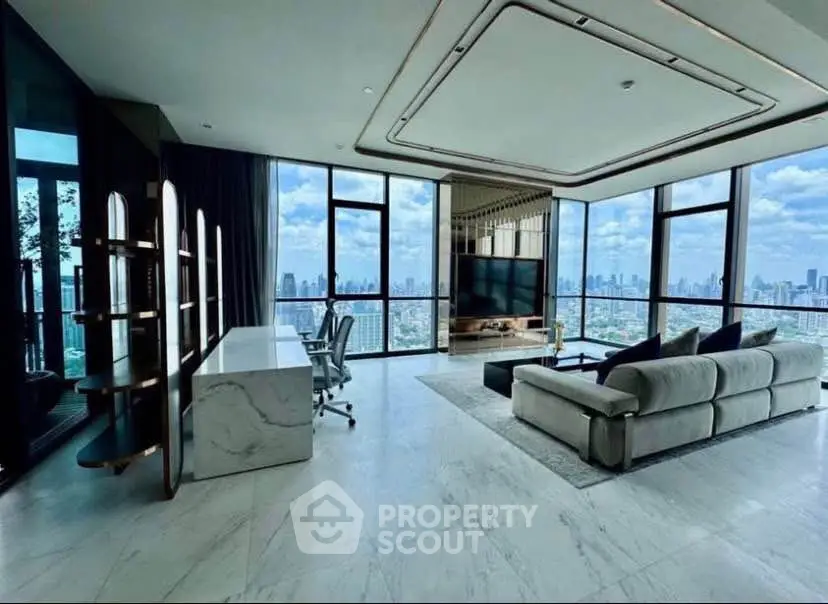 Luxurious living room with panoramic city views and modern furnishings