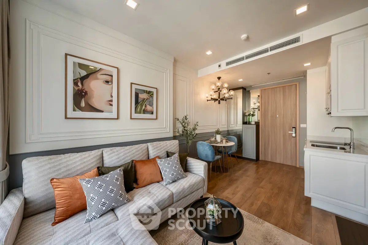 Stylish living room with modern decor, cozy seating, and elegant lighting in a contemporary apartment.