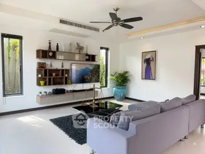 Spacious modern living room with stylish decor and natural light