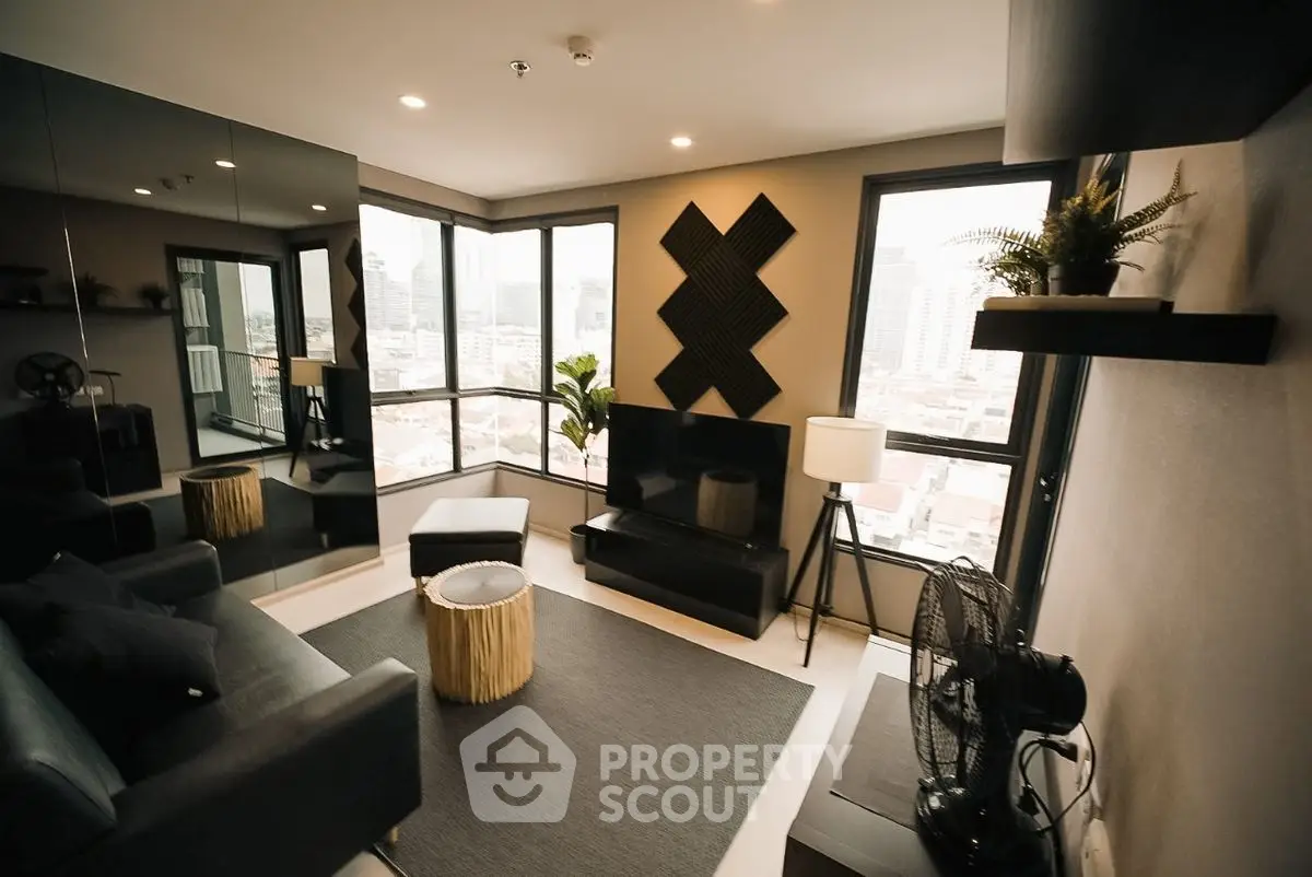 Modern living room with panoramic city view and stylish decor