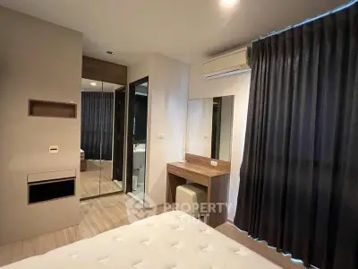 Modern bedroom with stylish decor and ample natural light