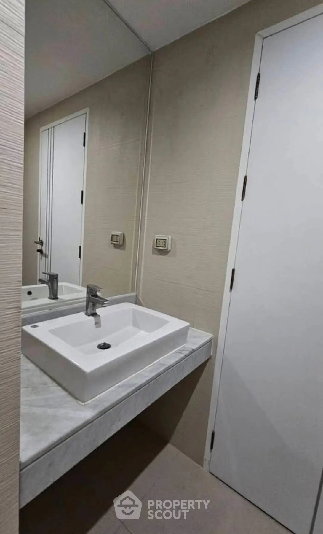 Modern bathroom with sleek sink and minimalist design