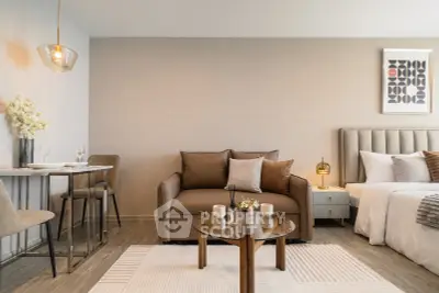 Modern studio apartment with cozy living area and stylish decor