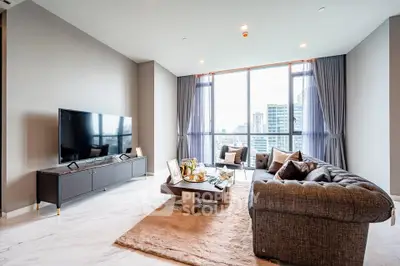 Luxurious modern living room with large windows and city view, featuring elegant furniture and decor.