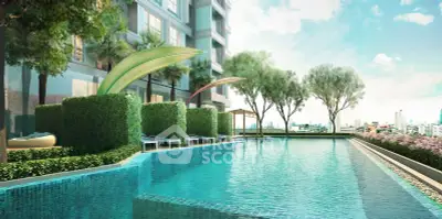 Luxurious condominium pool with city skyline view and lush greenery.