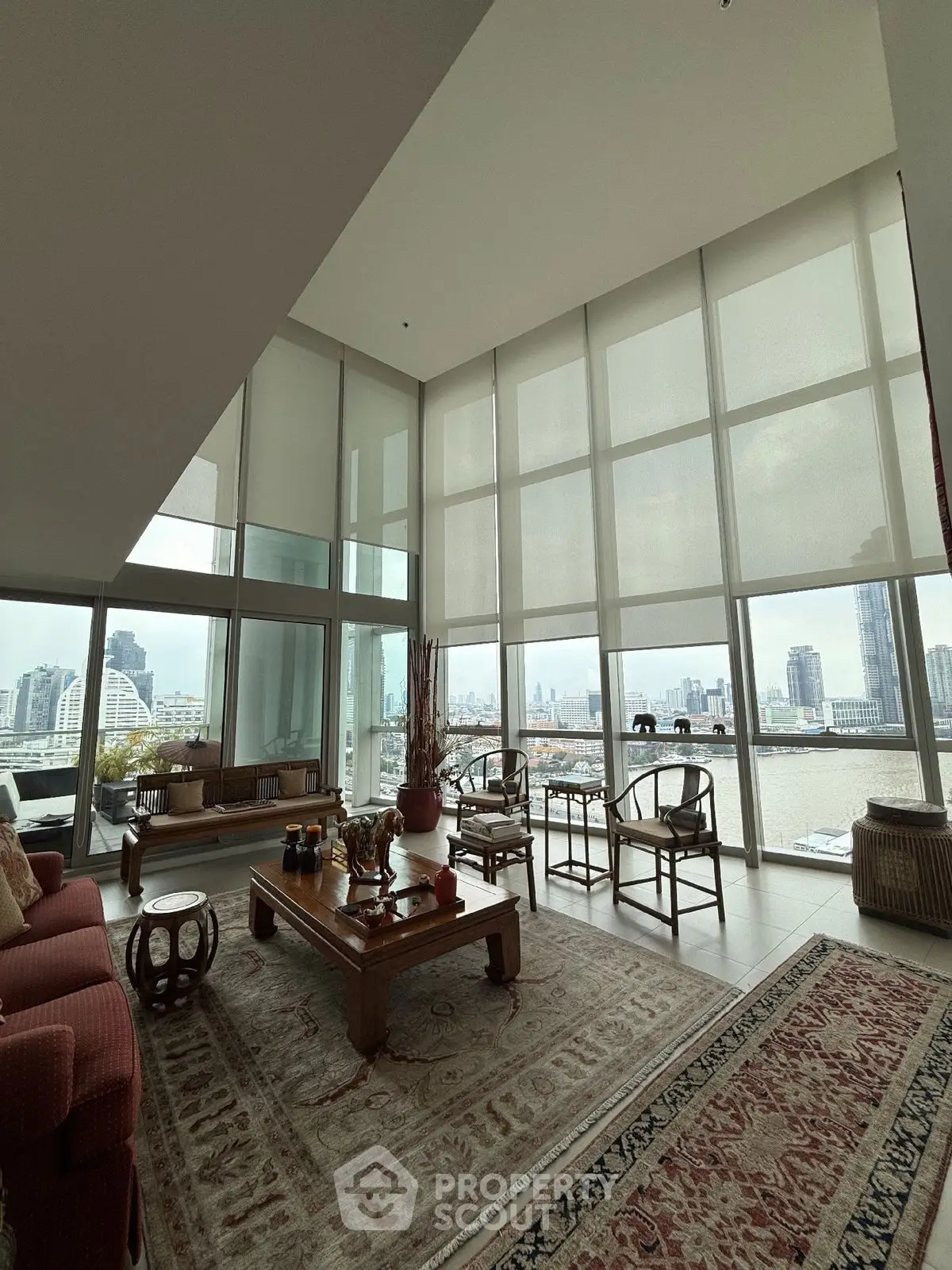 Luxurious high-rise living room with stunning city views and elegant decor