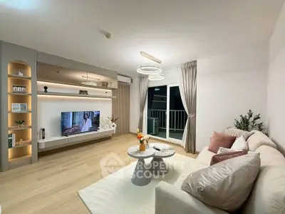 Modern living room with stylish decor and balcony access