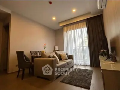 Cozy living room with modern decor and balcony view